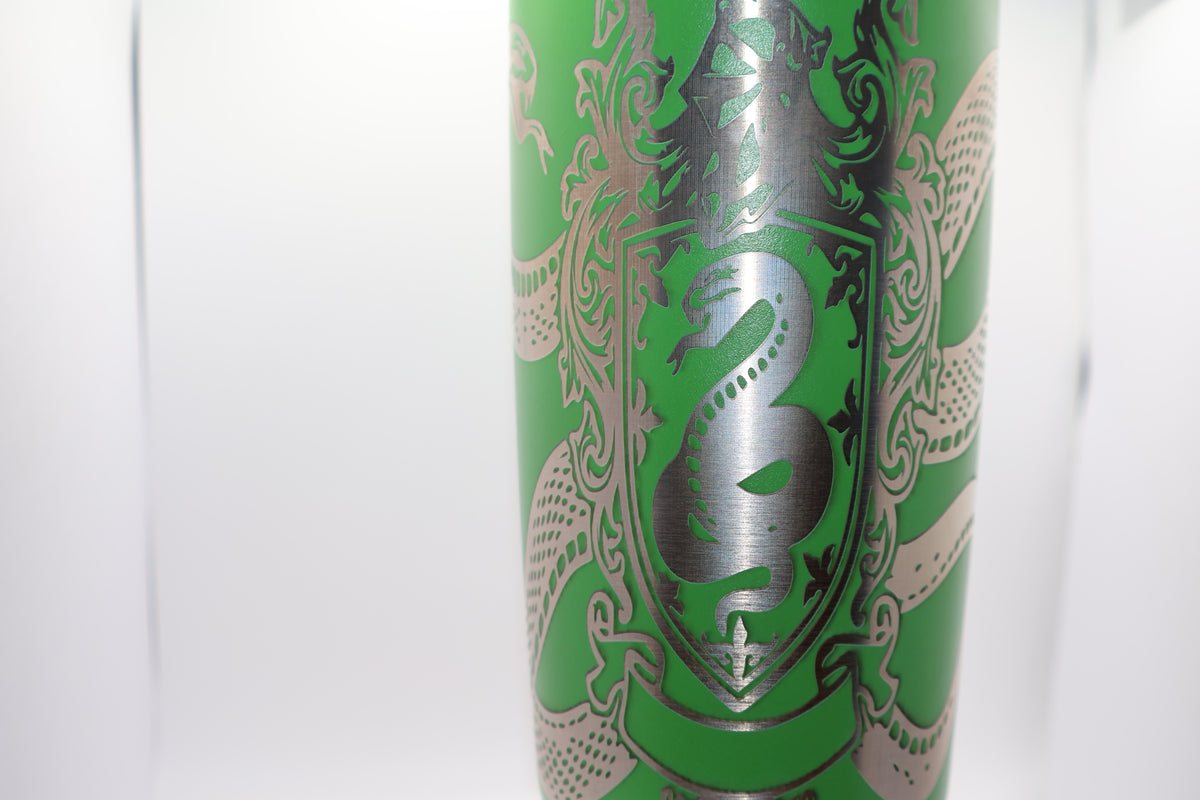 20oz tumbler with a snake and shield design