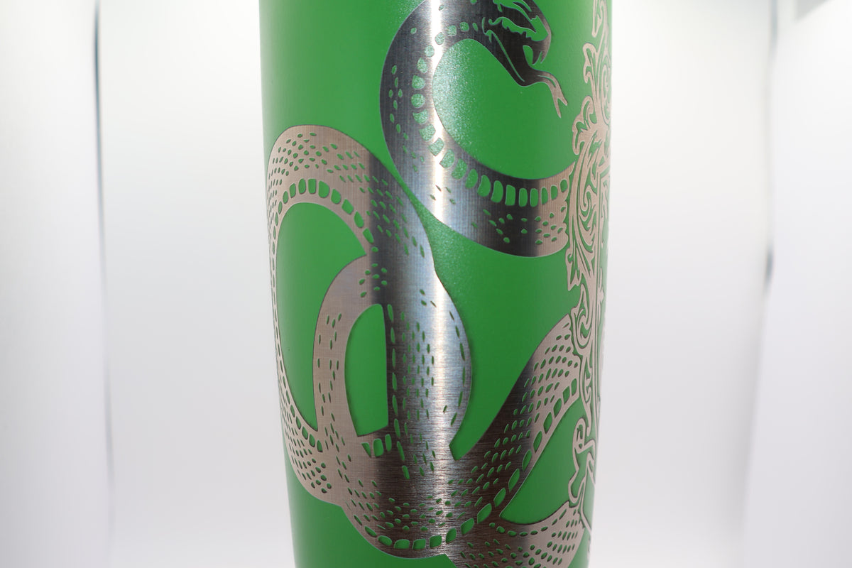 20oz tumbler with a snake and shield design